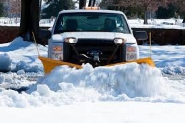 white snow plow truck